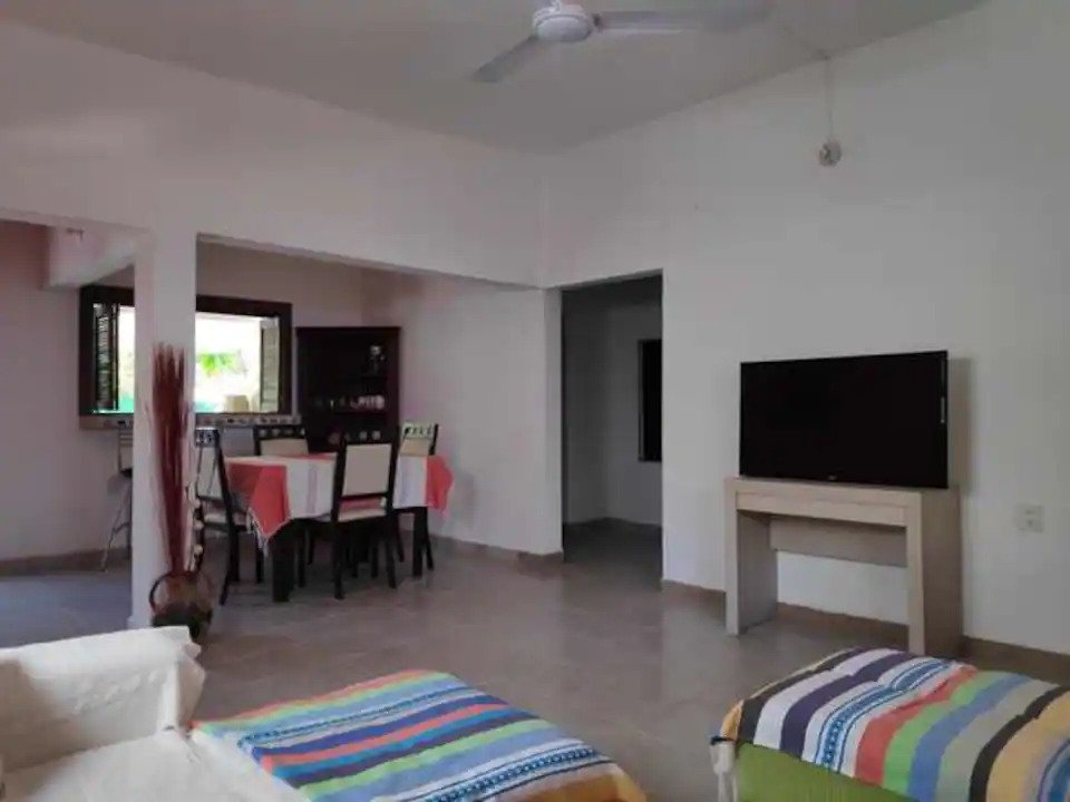 Living room with a televison and dining table